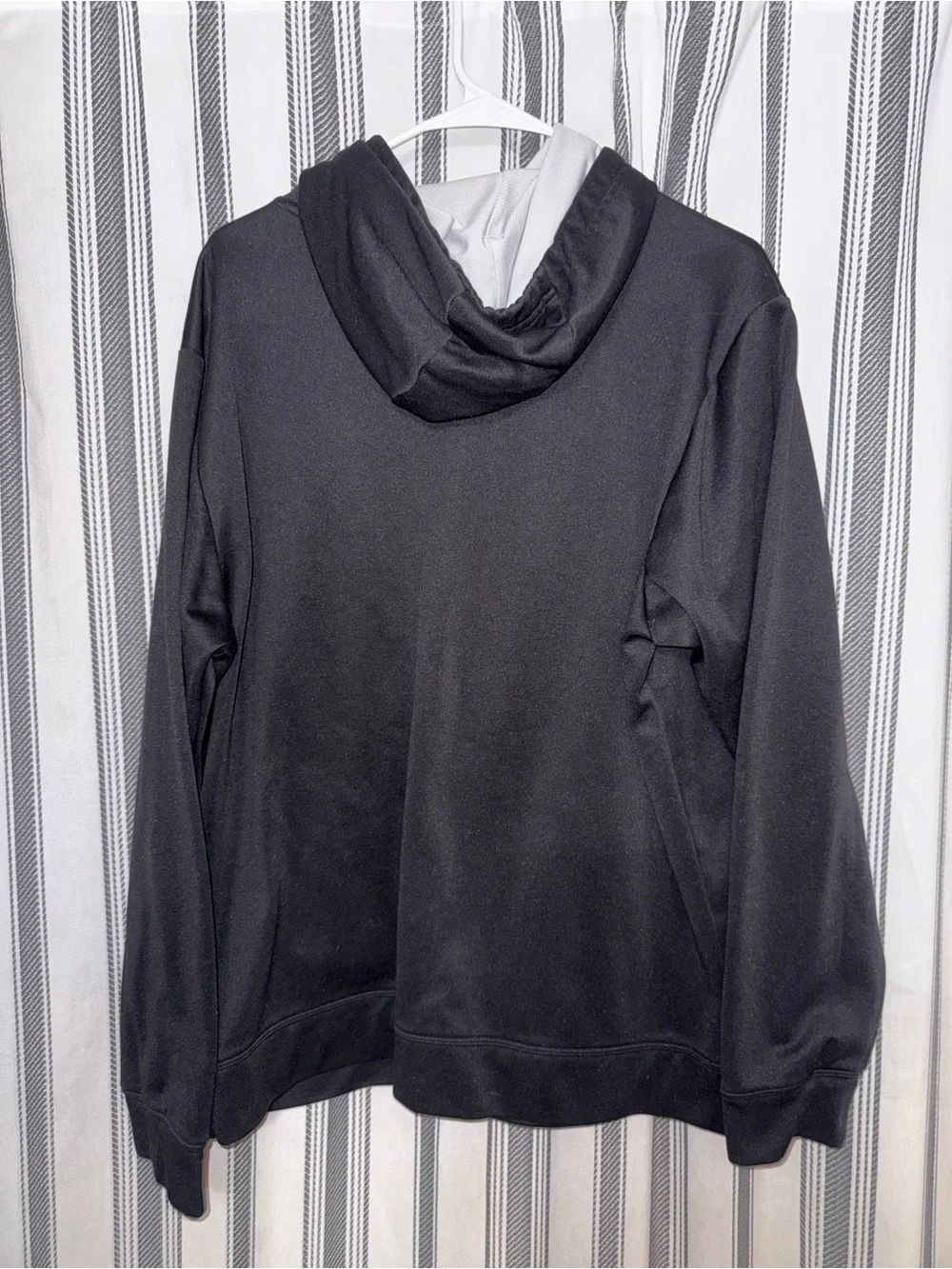 The North Face Black Hoodie with Red Logo and White Arch